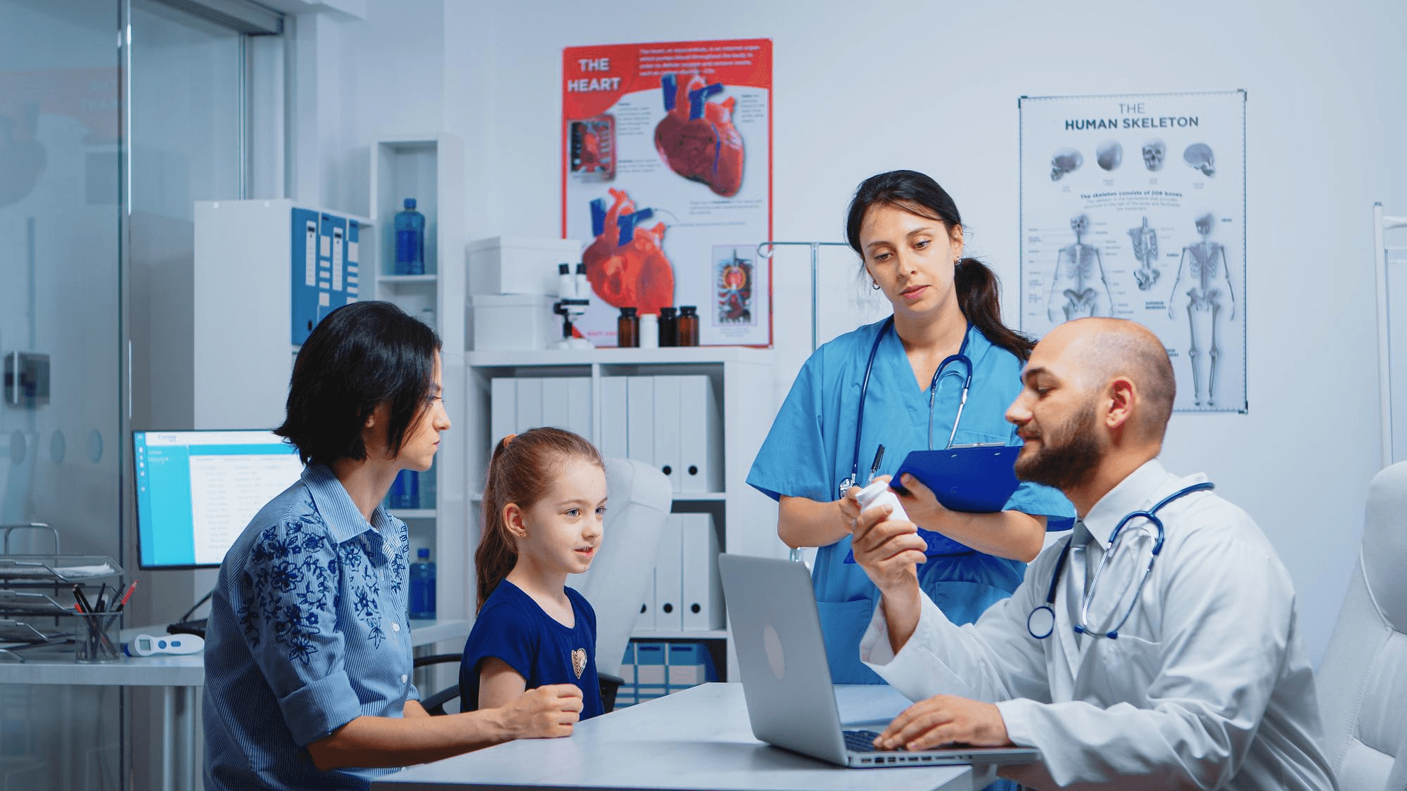 Healthcare professionals consulting with a patient