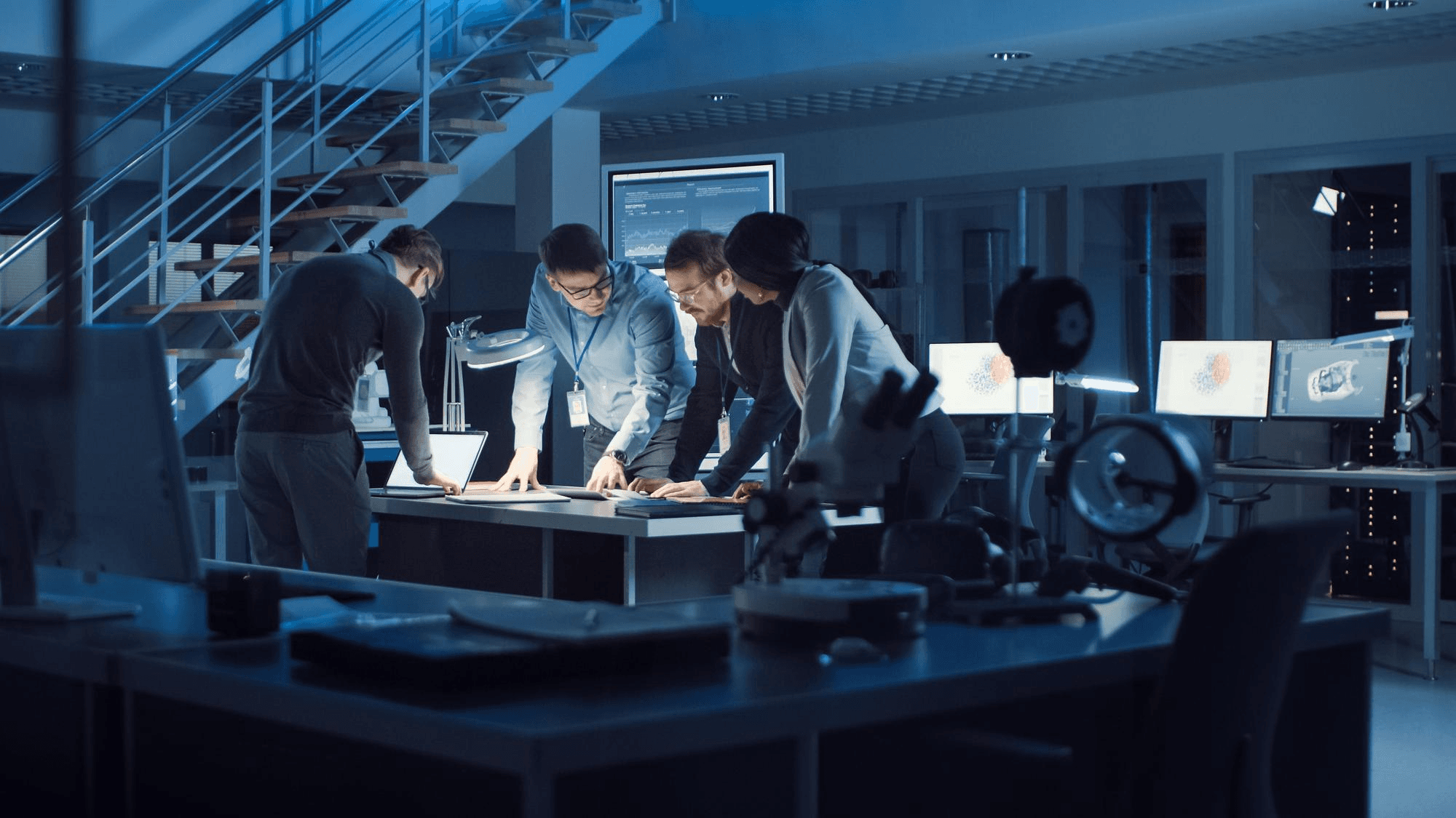 Technology team collaborating in a laboratory